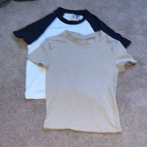 Two H&M tshirts. Very comfy. Blue is size S, beige is Size XS, they fit the same